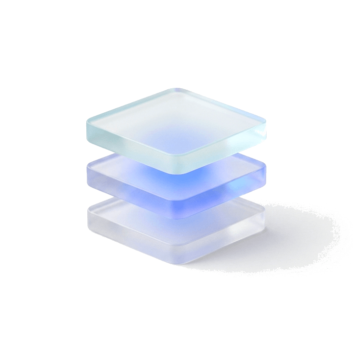 A glass slab being lowered onto a stack, light glowing along the joint where it lands
